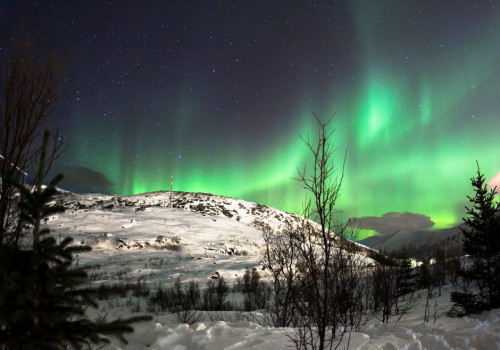 Hoe groot is de kans op noorderlicht in Tromsø bij 4 nachten in december 2026?